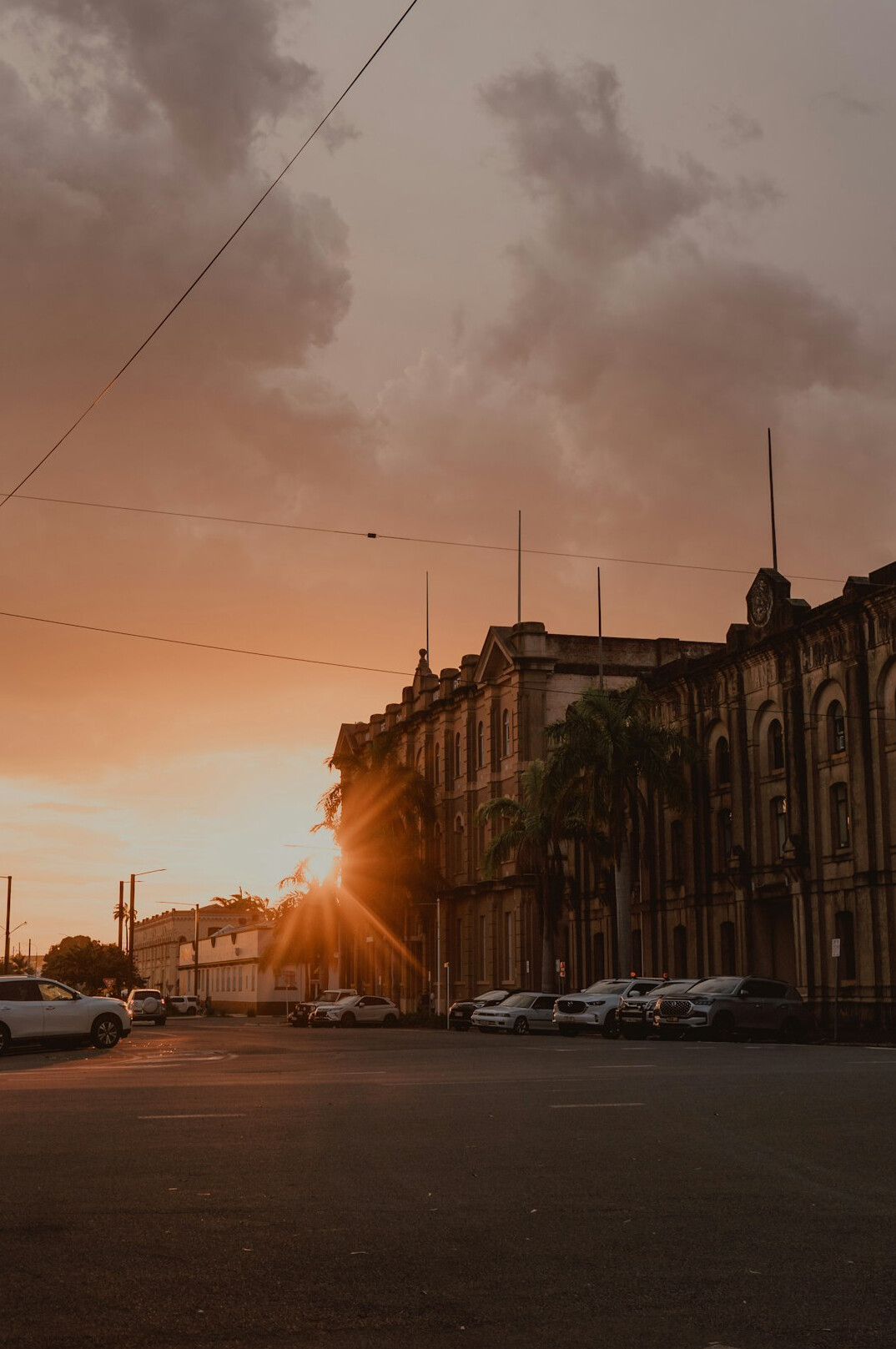 Old city street with historic buildings at dusk
